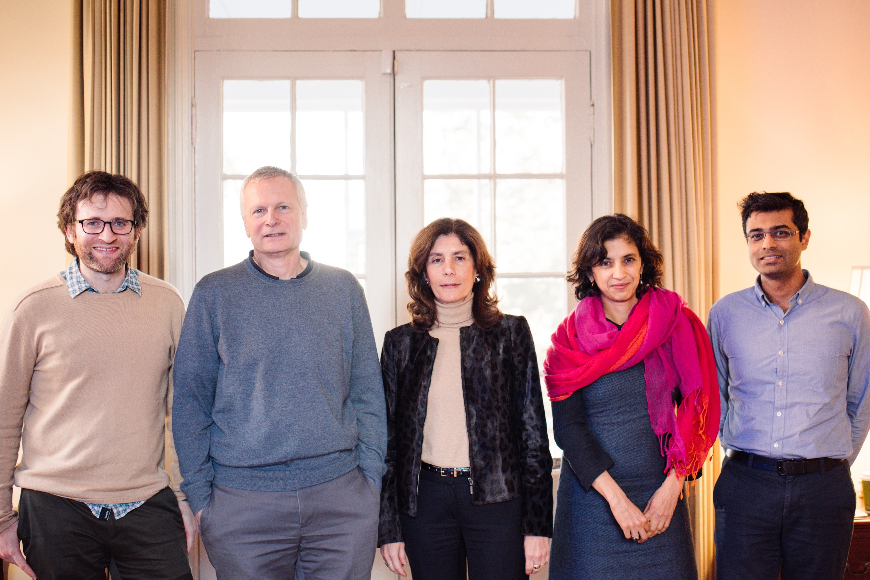 L-R: David Atkin, Dani Rodrik, Penny Goldberg, Rohini Pande, and Amit Khandelwal standing for photo.