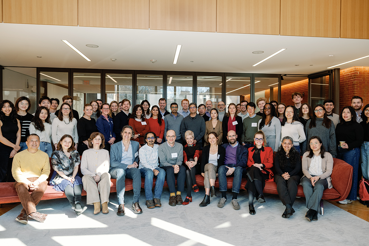 A group photo of attendees at the 2025 Kuznets mini-conference