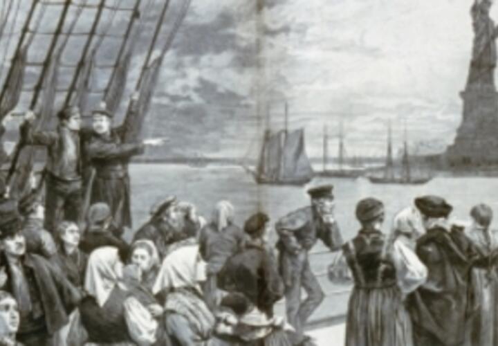 immigrants gathered to look at the statue of liberty